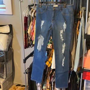 Medium washed distressed skinny jeans